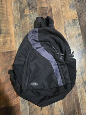 Samsonite Black and Gray Men's Sling Backpack with Front Zip Pocket